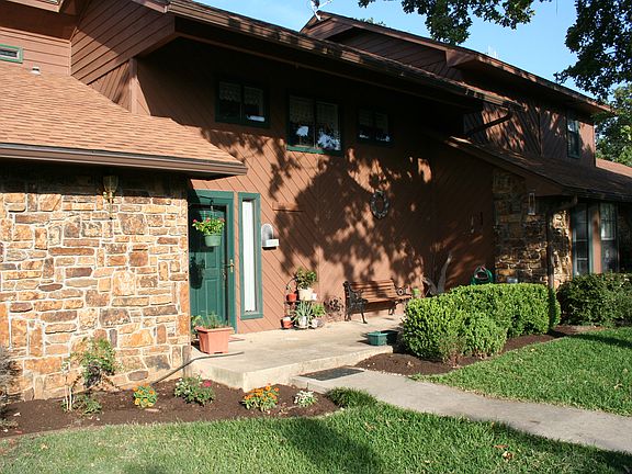 front porch w/ flower beds