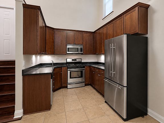 Kitchen with stainless steel appliances and granite countertops