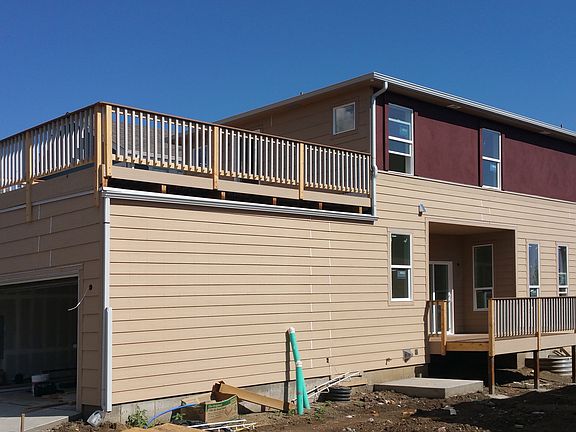 Rear/side w/rooftop deck