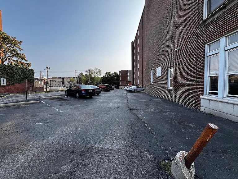For an additional fee, parking may be available in a numbered spot adjacent to the building; you are welcome to ask.