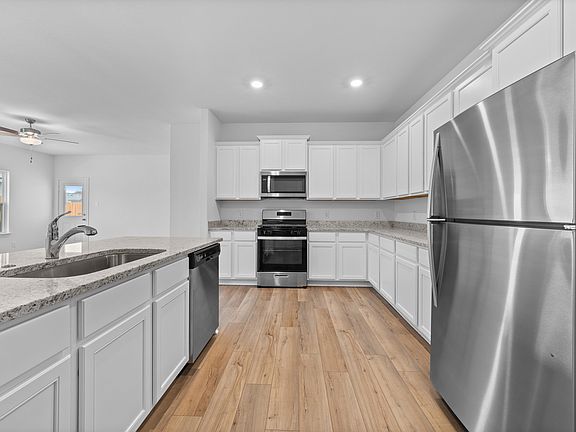 The chef ready kitchen with stainless steel appliances