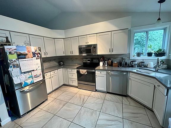 Kitchen, lots of natural light +sky light