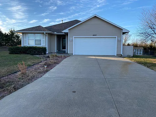 4037 NW Krysten St Photo 1