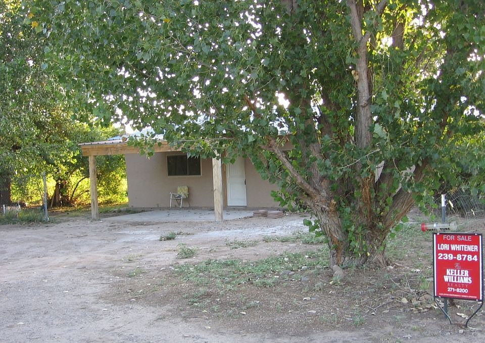 Real Adobe home Nestled Amongst Alfalfa Fields