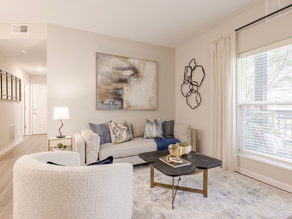 Newly Renovated Living Room with Hardwood-Style Flooring