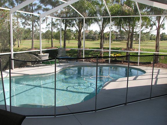 Caged Pool Overlooking Golf Course
