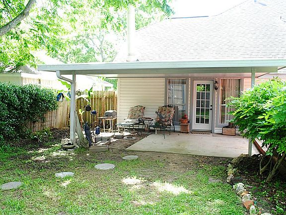 Covered back patio perfect for entertaining and just relaxing.