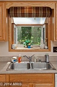 Kitchen Sink w/ Window to Back Yard