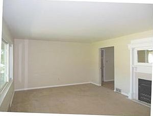 Living Room. The living room is very spacious and filled with lots of sunlight