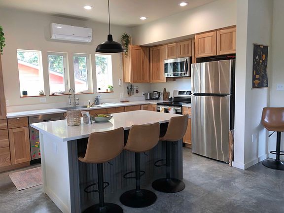 The Kitchen has new appliances, solid hickory cabinets and quartz countertops.