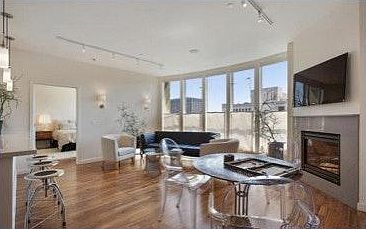 Sought After Front Facing Unit with Curved Windows--Striking