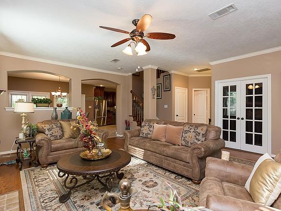 Beautiful Wood Floors and Extensive Crown Molding