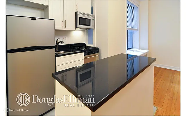 Rented by Douglas Elliman | media 13