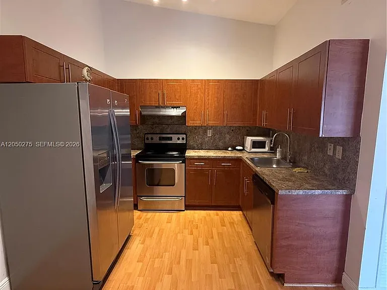 7699 SW 153rd Ct #203 — Photo 2