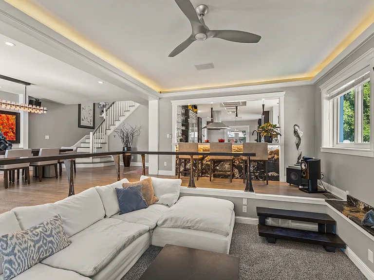 View of Living room into Dining Area and Kitchen