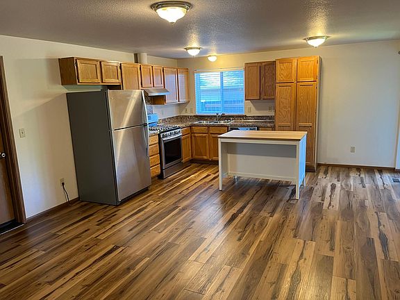 Open Kitchen that flows to dining room area.