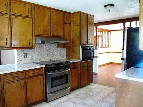 Kitchen features updated stainless appliances