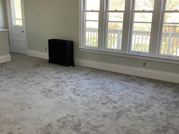 Large living room with tons of natural light.