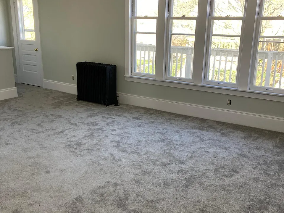 Large living room with tons of natural light.