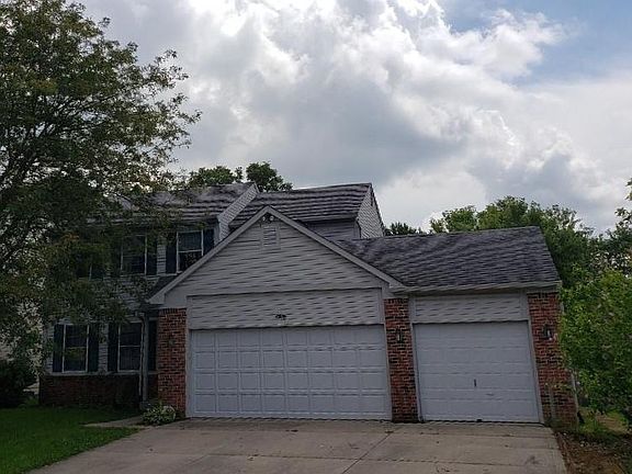 3rd garage bay is drive through with full rear door to cement pad in front of shed