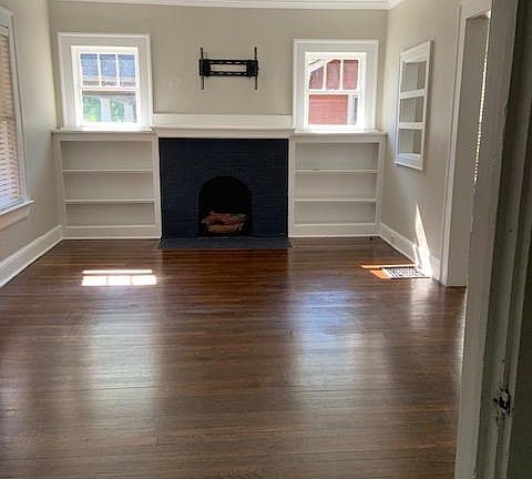 View of living room including built-ins and n