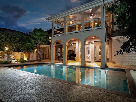 Custom Estate on over 1 acre located near The Woodlands is perfect for entertaining.