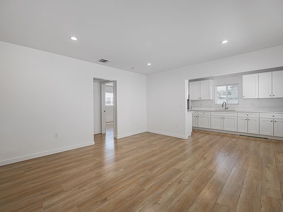 Living Room Space Leading to Bedroom and Bathroom