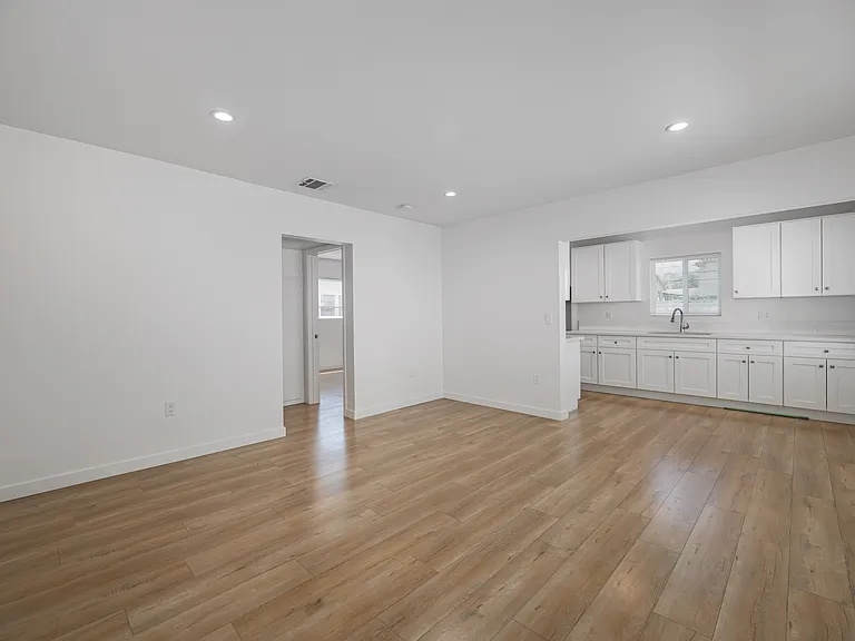 Living Room Space Leading to Bedroom and Bathroom