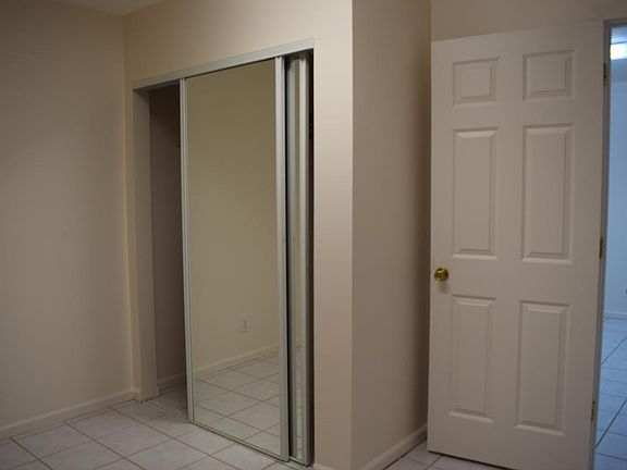2 adjacent rooms with air conditioning systems and sliding mirror closet