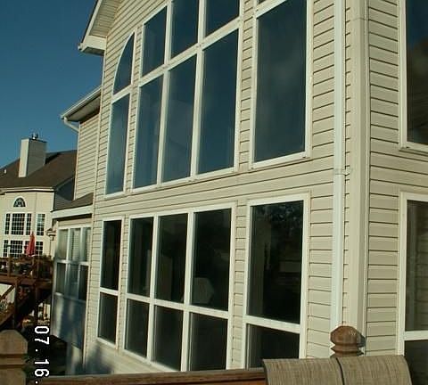 Wall of window in 2 stry great room.