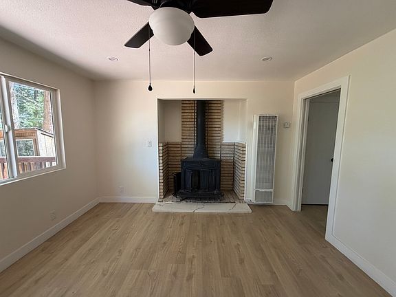 Living room with wood burning stove.