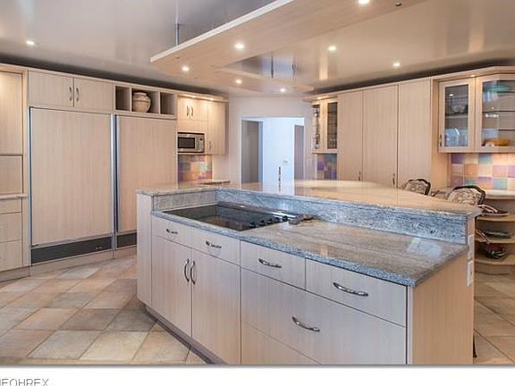 absolutely a terrific Chef's Kitchen with Side by side Sub-Zero Refrigerator/Freezer, Granite counte