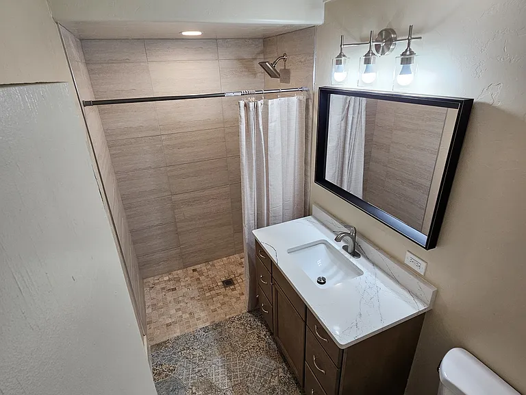 Completely remodled bathroom with solatube for natural light during the day