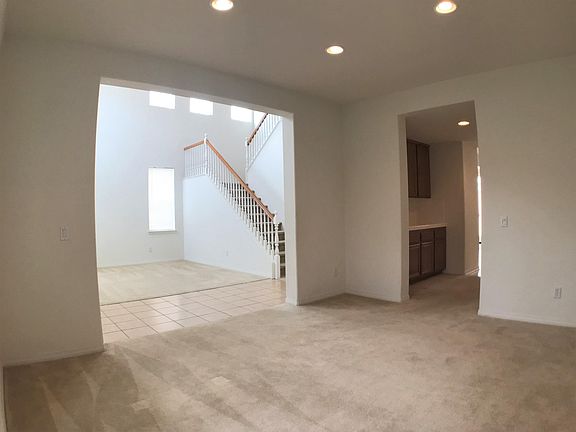 Looking at living room and butler's pantry from dining room
