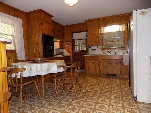 View of kitchen from den
