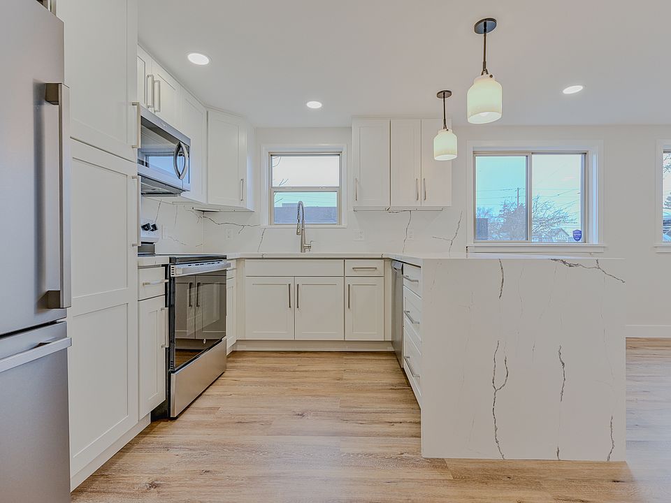 Newly Renovated Kitchen with Plenty of Cabinet Space and Brand New Stainless Steel Appliances