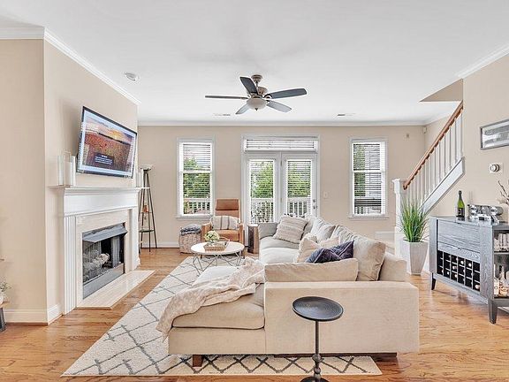 Spacious open concept living room with fireplace