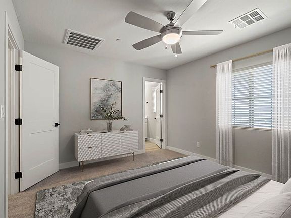 The master bedroom has a ceiling fan.