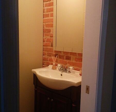 Half bath on main floor with pocket door
