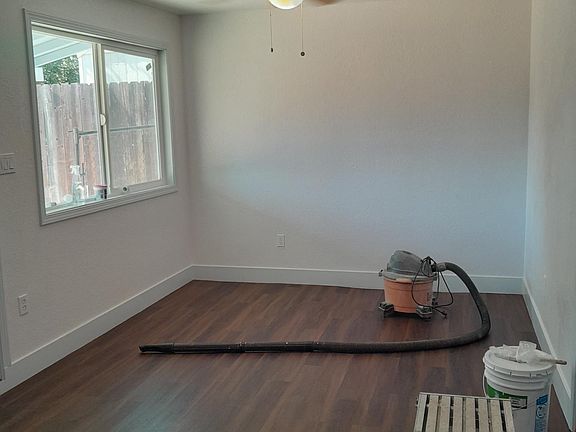 Living area, bedroom off to the right