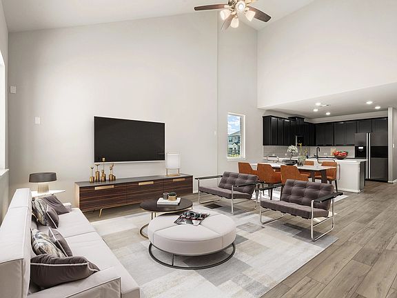 Open concept living space. Note Sample product photo - actual exterior and interior selections may