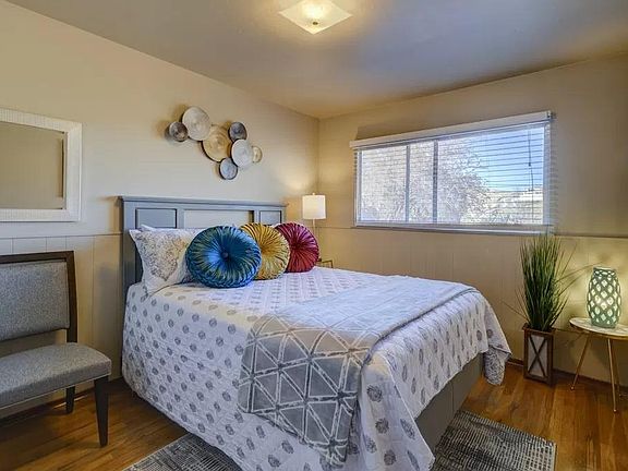 Bedroom #2 features a comfortable queen bed, inviting decor, and thoughtful finishing touches.