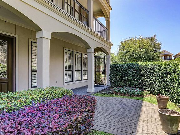 Serene side yard ideal for gardening and grilling.