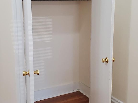 A clothes hanging closet built into the middle room for extra hanging space.