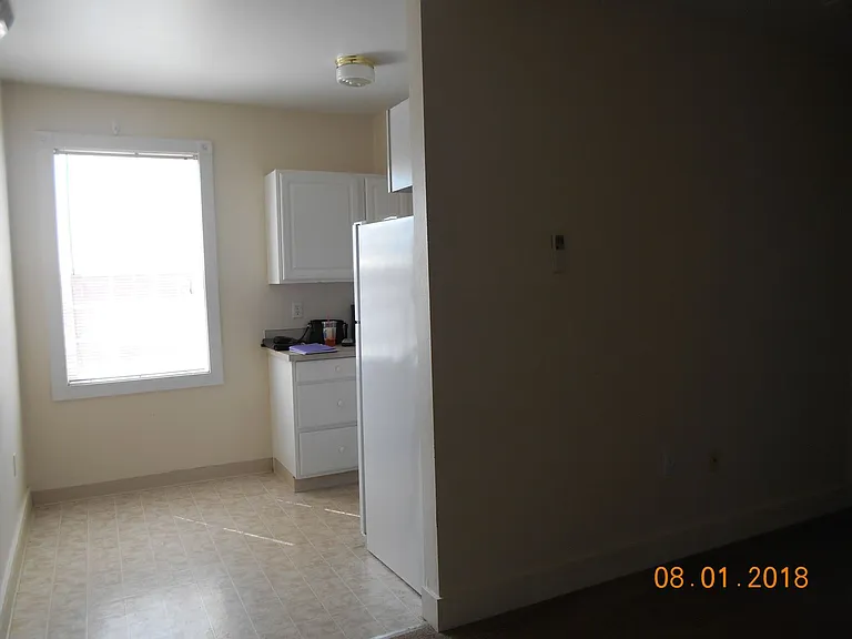 312-16 E 1st St — Photo 9