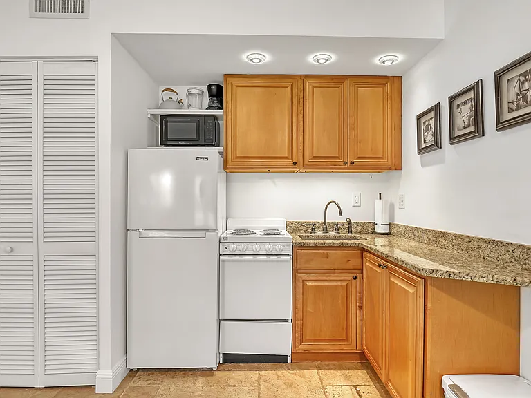 11863 Wimbledon Cir #408 — Photo 7