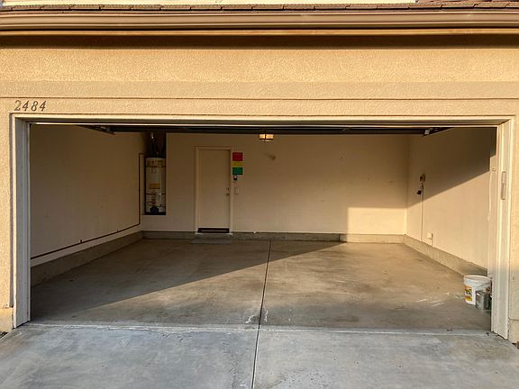 2 CAR BUILT-IN GARAGE IN REAR