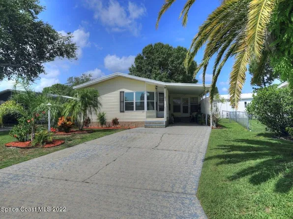 1027 Thrush Cir, Barefoot Bay, FL 32976