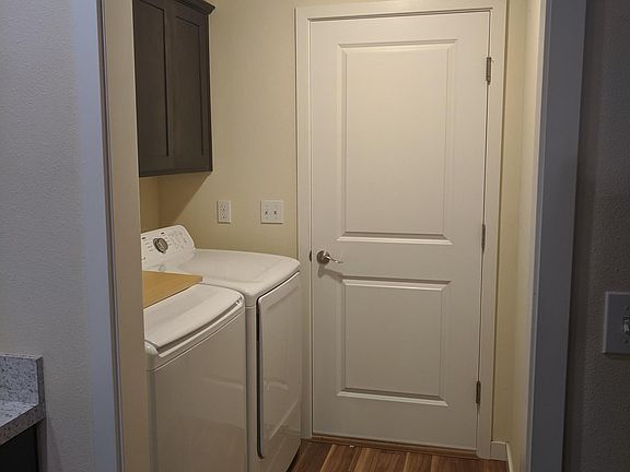 Laundry just off kitchen.