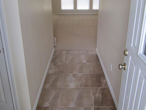 Walk in entry way with tile - 2 bedrooms are to the left wit